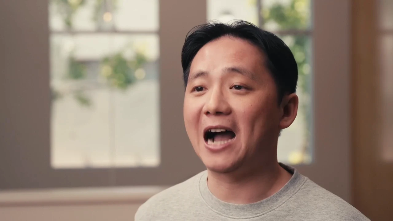 Close interview framing of AKOOL founder Jiajun Lu